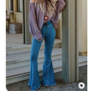 Free people mid rise flared jeans NWT 25